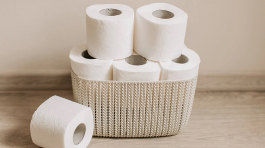 Toilets rolls stacked in basket